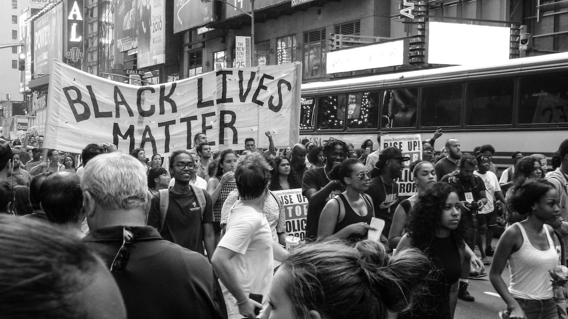 black lives matter banner march